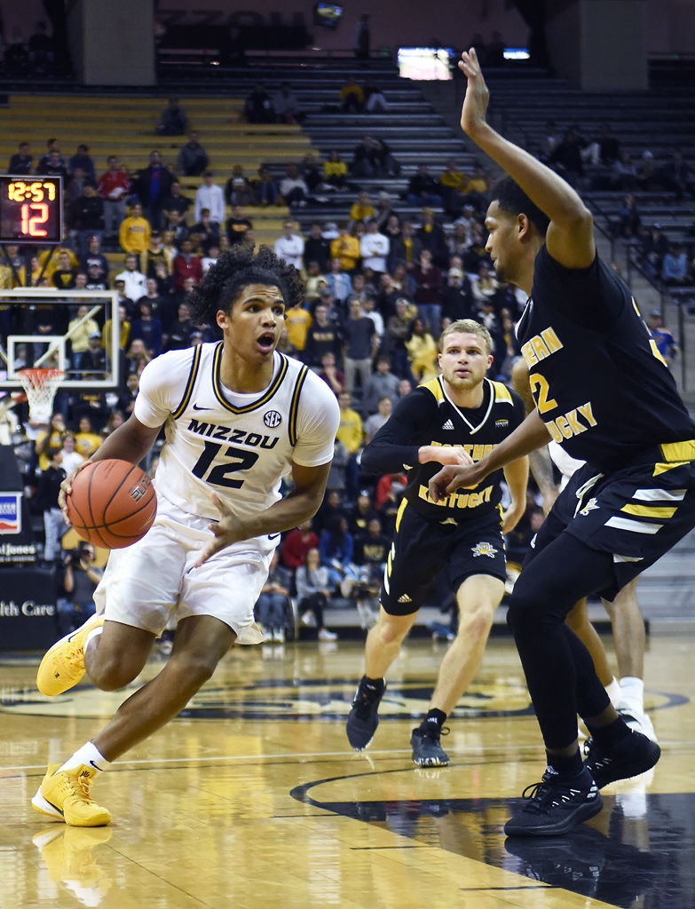 Dru Smith dribbles up